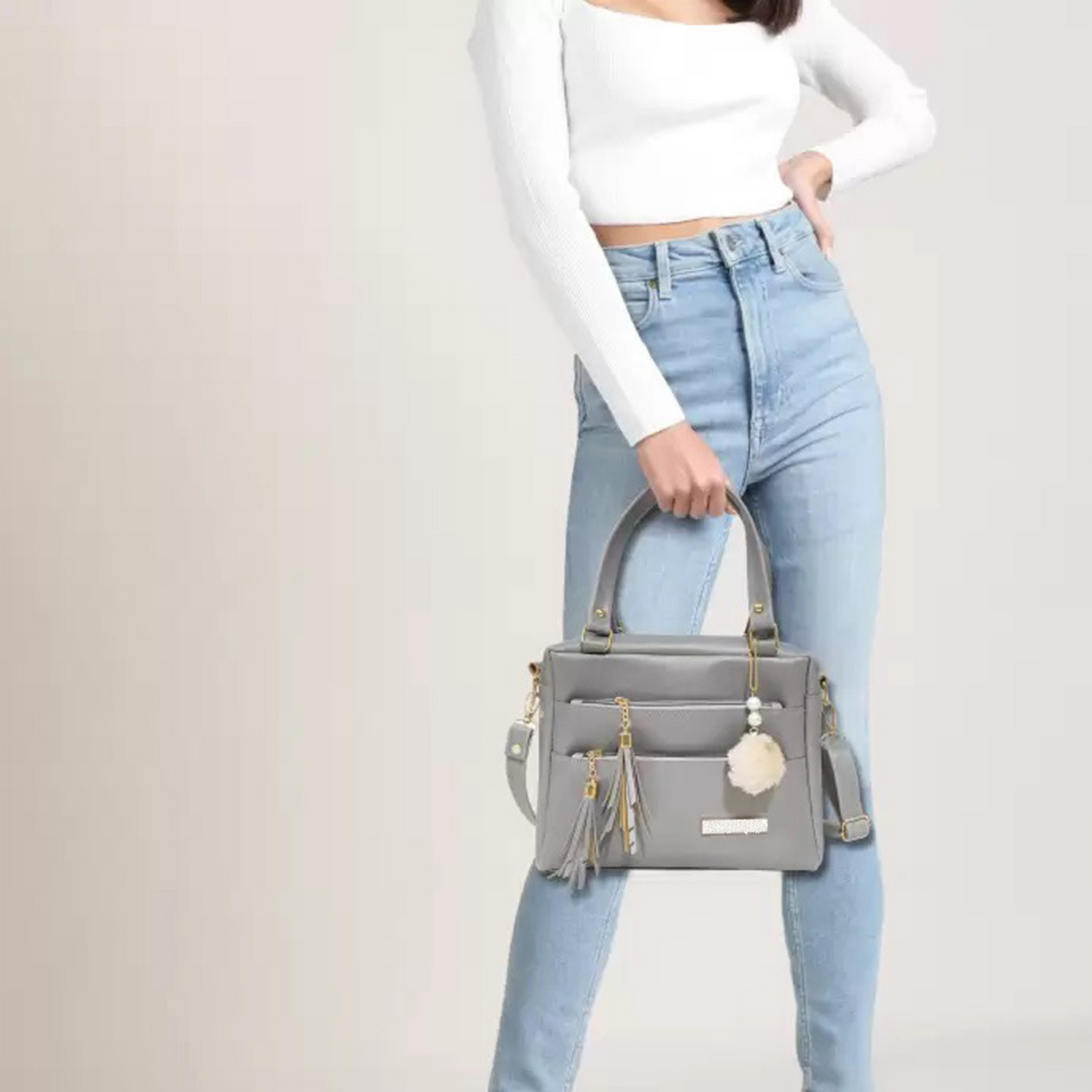 Chic Grey Tassel Handbag – Dual Carry with Pom Charm